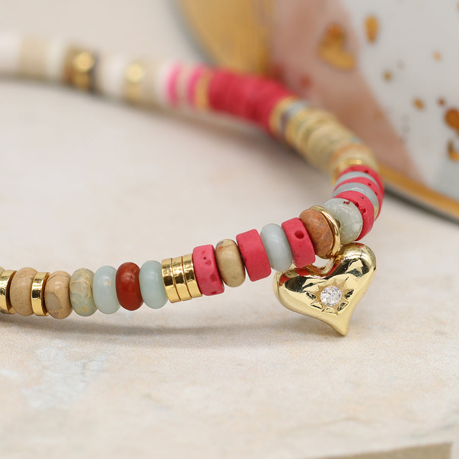
                  
                    Pink Semi Precious Stone With Gold Heart Charm Bracelet
                  
                