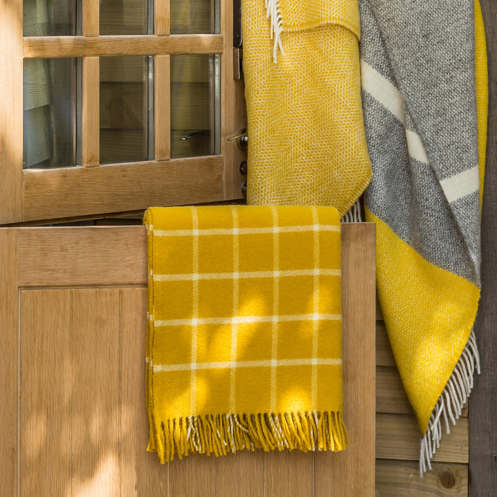 
                  
                    Tweedmill Chequered Throw - Yellow
                  
                